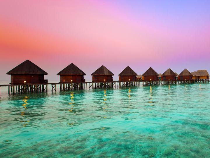 Maldives bungalows during sunset