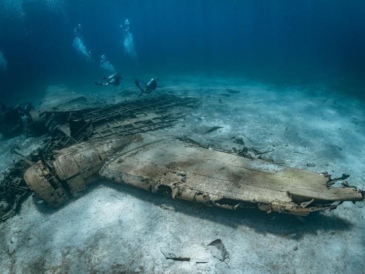 A shipwreck on the bottom of the ocean.