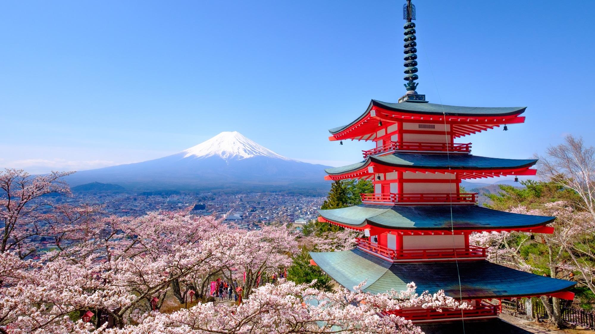 Mount Fuji in autumn behind a red pagoda in Fujiyoshida, Japan